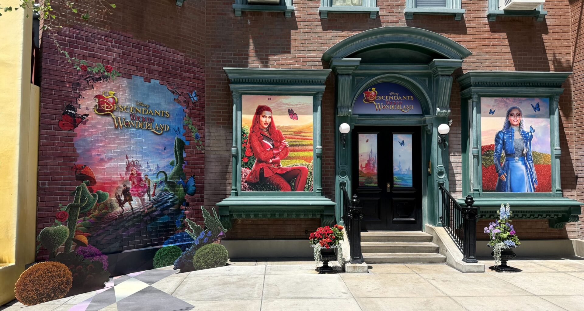 The display spans all across the brick facade, as well as the doors and windows of the building.