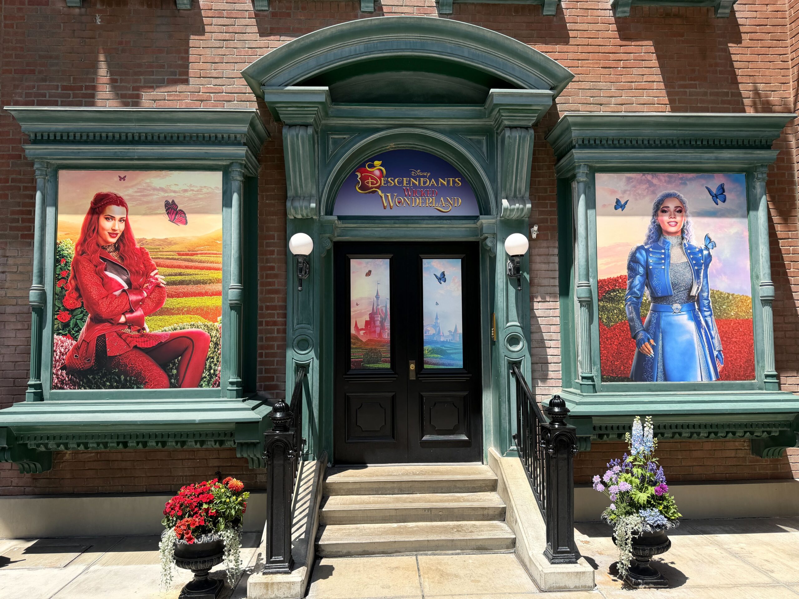 The windows of the building feature Red and Chloe in front of flowers and fields while red and blue butterflies fly around them, respectively. The doors have peek-through displays of a castle and the movie's film logo.