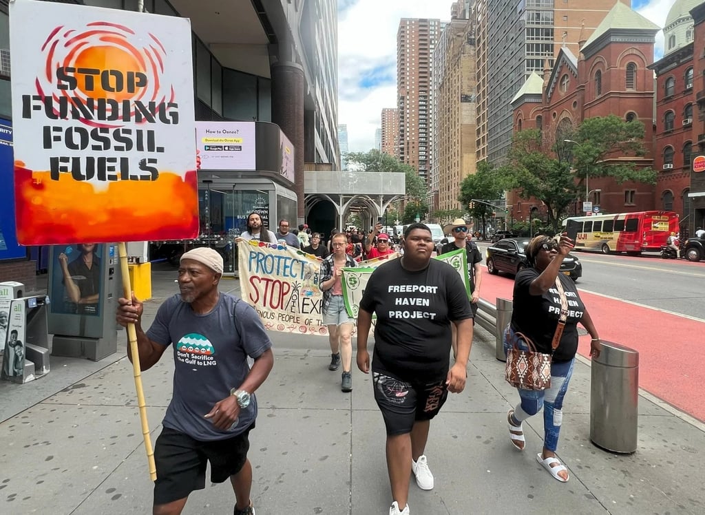 Campaigners from Freeport Haven Project march against fossil fuel funding. Photo: Freeport Haven Project