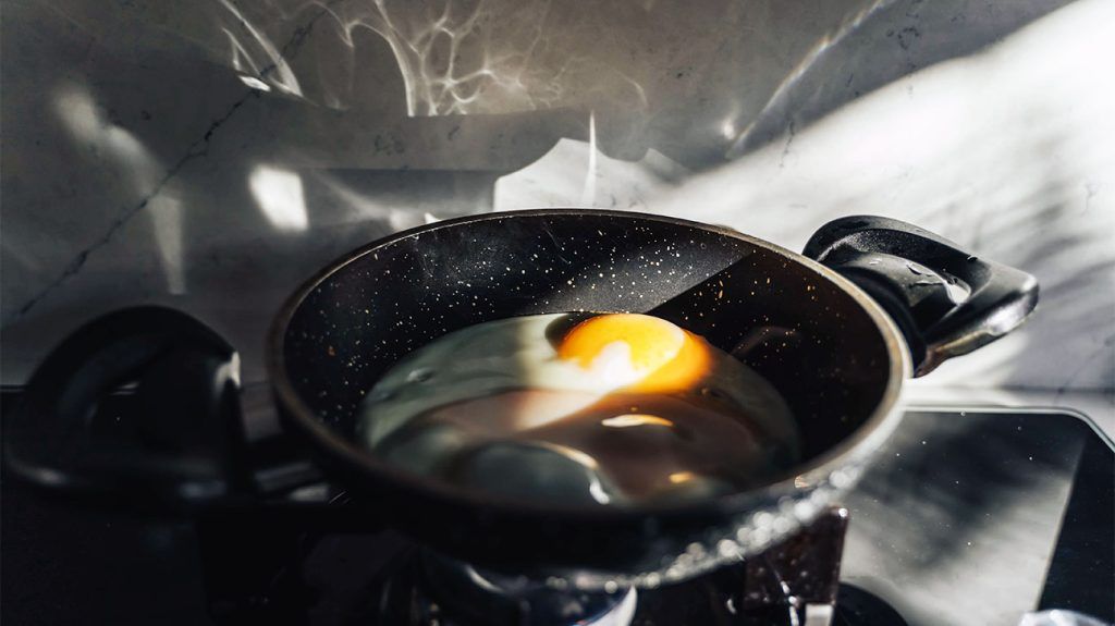 two sunny side up eggs in a pan