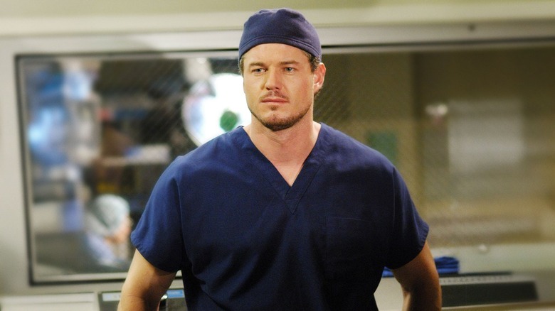 Mark in a scrub cap looking serious on Grey's Anatomy