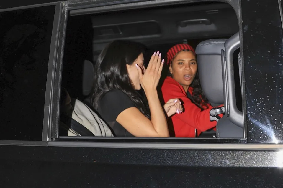 They all tried to hide their faces from paparazzi but could still be seen laughing and chatting. BACKGRID