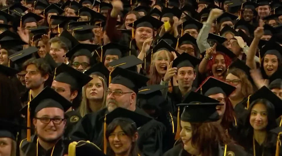 UCF graduates cheering
