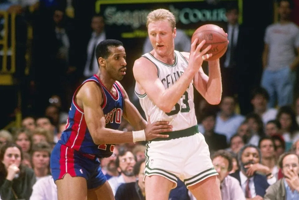 1988: Detroit Pistons forward Adrian Dantley guards Boston Celtics forward Larry Bird during game at Boston Garden in Boston, Massachusetts. Mandatory Credit: Allsport /Allsport