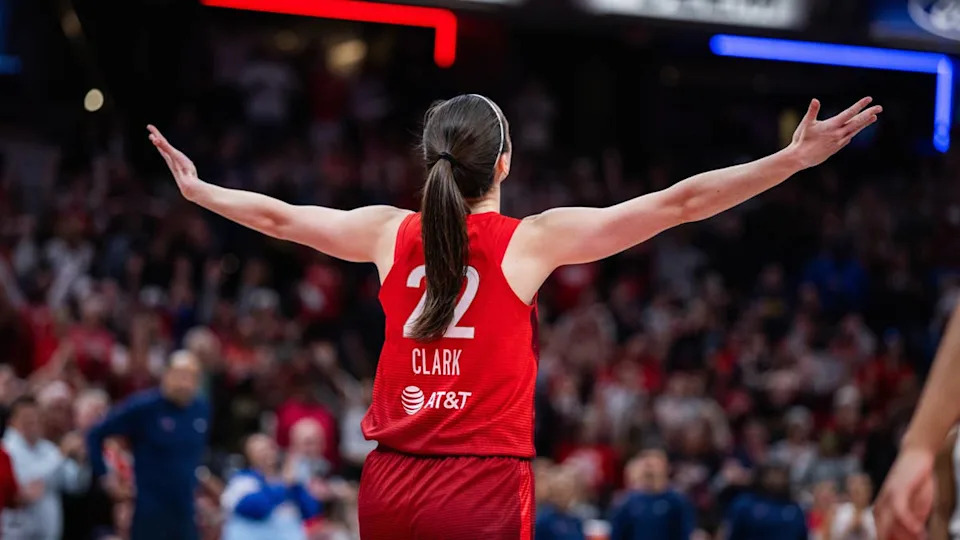 Indiana Fever guard Caitlin Clark (22) celebrates a made shot during a WNBA game.Trevor Ruszkowski-Imagn Images