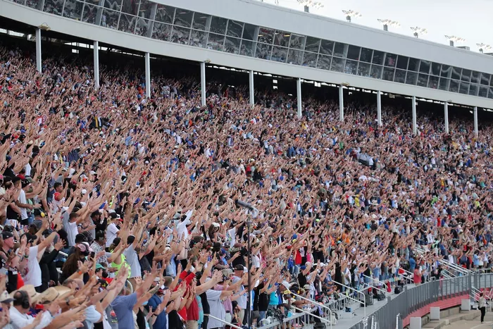 Fans gesturing number 8 for Kyle Busch