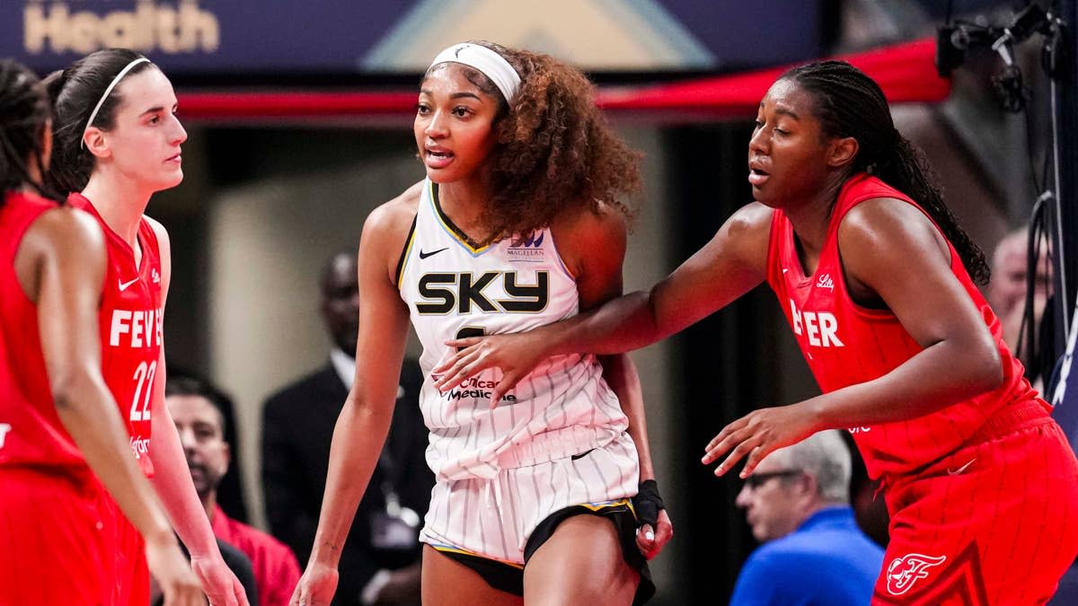Chicago Sky forward Angel Reese (5) reacts to a flagrant foul from Indiana Fever guard Caitlin Clark (22).Grace Smith/IndyStar / USA TODAY NETWORK via Imagn Images