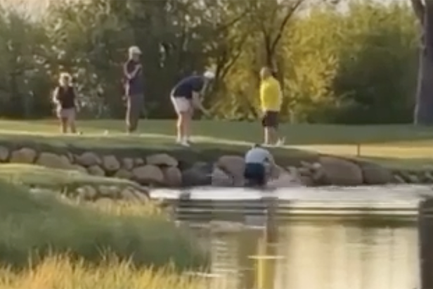 ‘He’s gonna drown him!’: Wild golf fight spills into water hazard as one golfer appears to hold another underwater