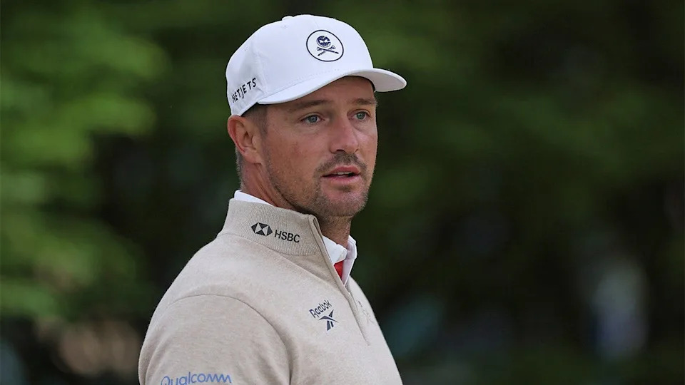 Bryson DeChambeau looking on during a practice round at Aronimink Golf Club.