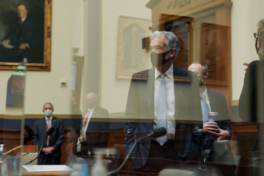 Powell wears a protective mask while arriving for a House Financial Services Committee hearing in Washington, DC, on December 2, 2020.