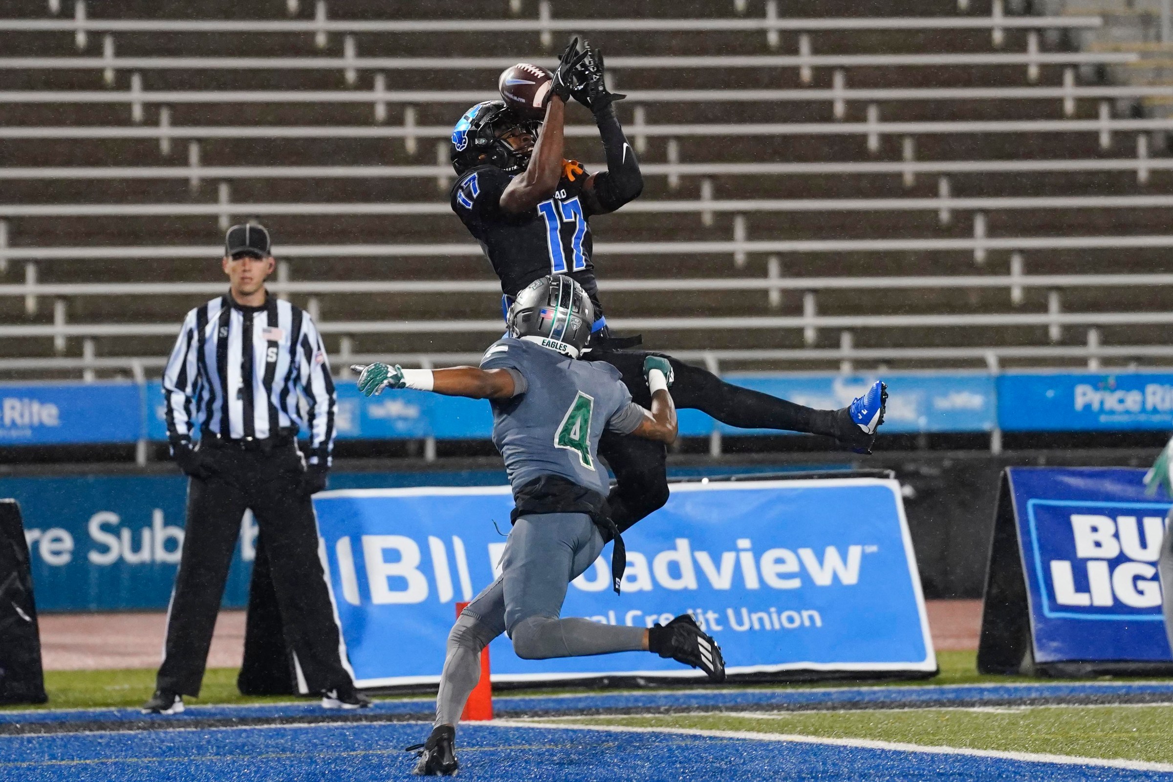 AMHERST, NY - NOVEMBER 21: Buffalo Bulls Wide Receiver Nik McMillan (17) attempts to make a catch against Eastern Michican Eagles Defensive Back Daiquan White (4) during the second half of the College Football game between the Eastern Michigan Eagles and the Buffalo Bulls on November 21, 2023, at UB Stadium in Amherst, NY. (Photo by Gregory Fisher/Icon Sportswire via Getty Images)