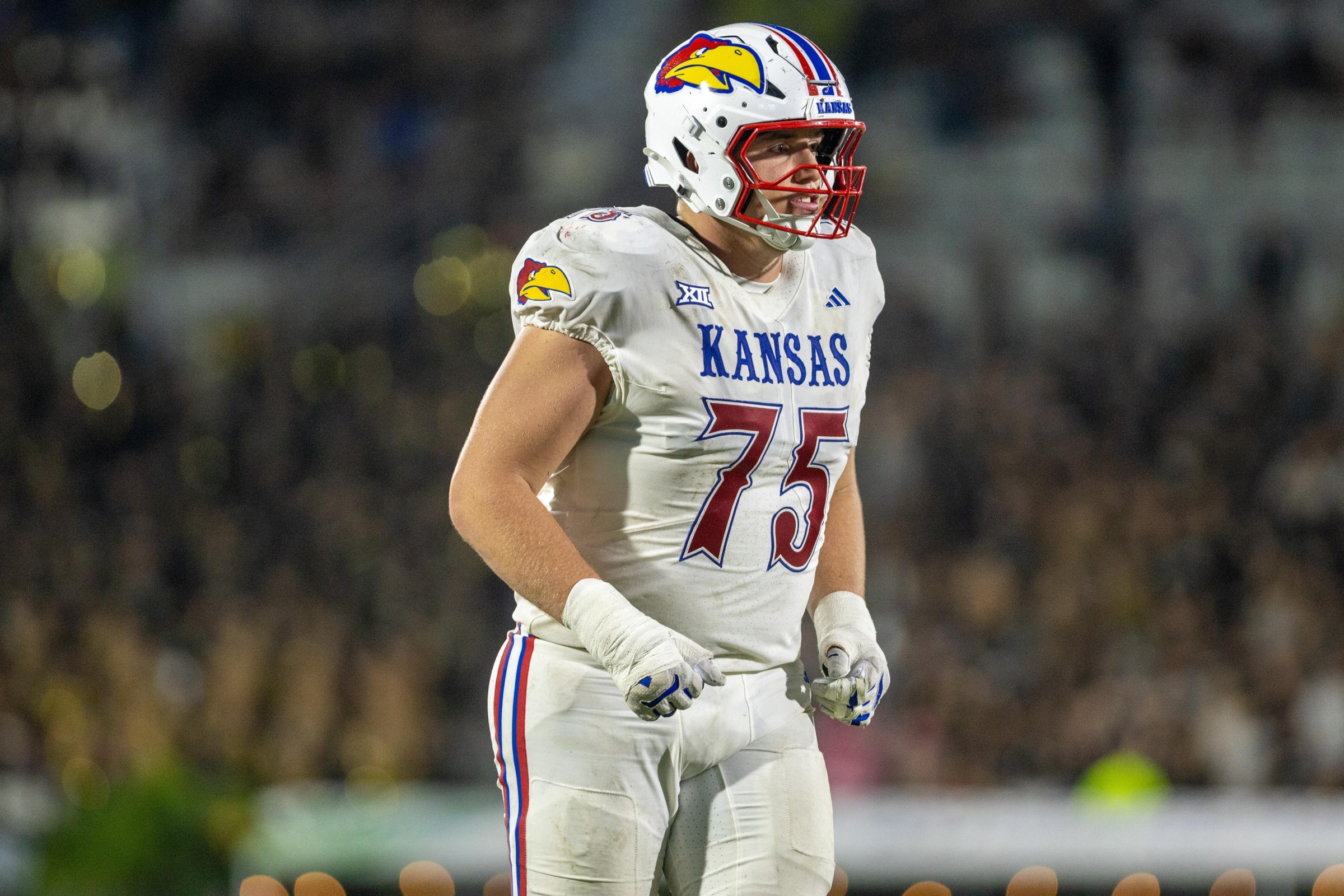 ORLANDO, FLORIDA - OCTOBER 4: Calvin Clements #75 of the Kansas Jayhawks enters the field against the UCF Knights during the the second half at FBC Mortgage Stadium on October 4, 2025 in Orlando, Florida. (Photo by Eston Parker/ISI Photos/ISI Photos via Getty Images)