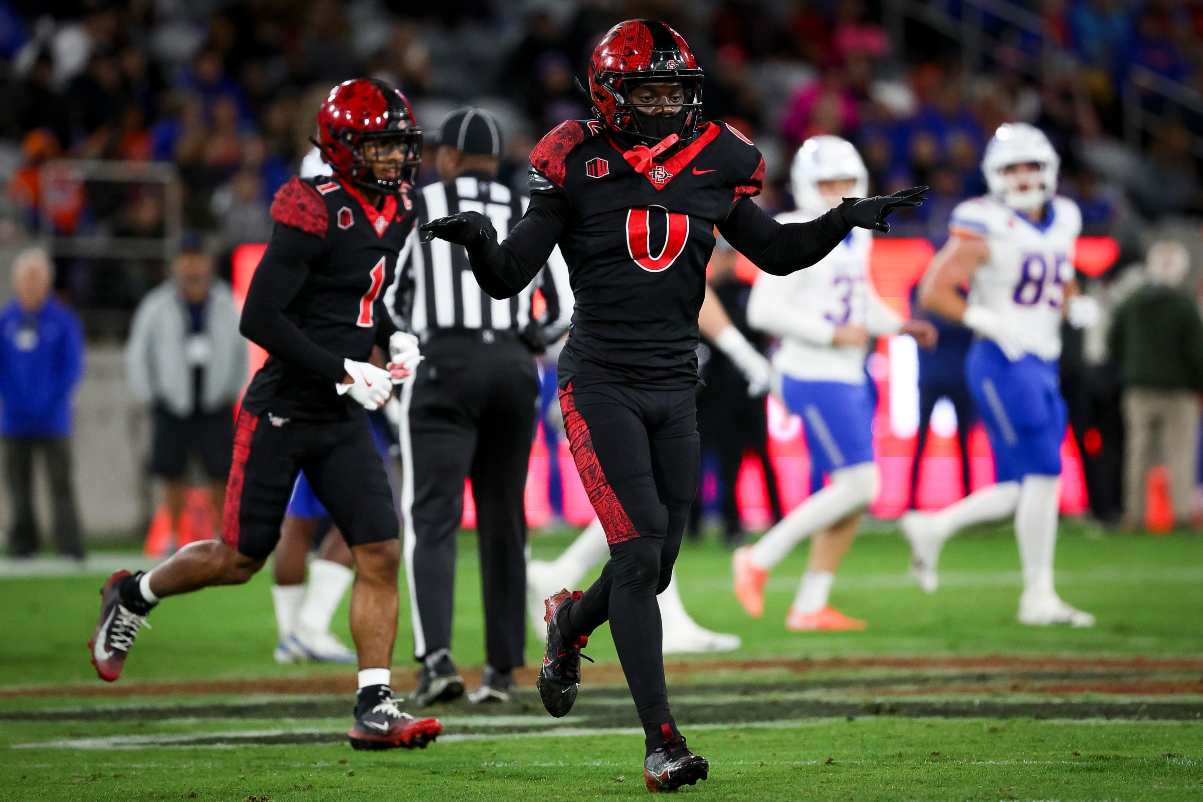 San Diego, California - November 15: Bryce Phillips #0 of the San Diego State Aztecs celebrates on the field during their game against the Boise State Broncos at Snapdragon Stadium on Saturday, Nov. 15, 2025 in San Diego, California. (Meg McLaughlin / The San Diego Union-Tribune via Getty Images)