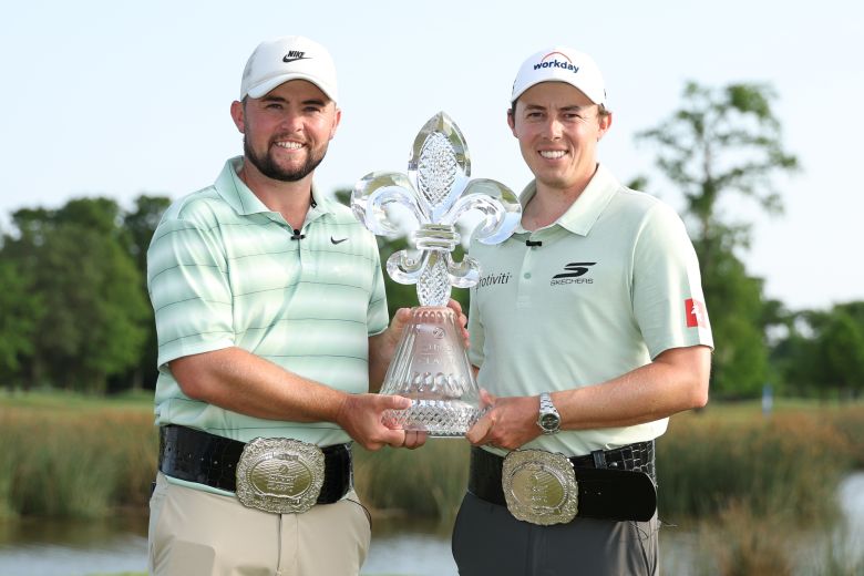 The Fitzpatrick brothers pose with their trophy after winning the Zurich Classic.