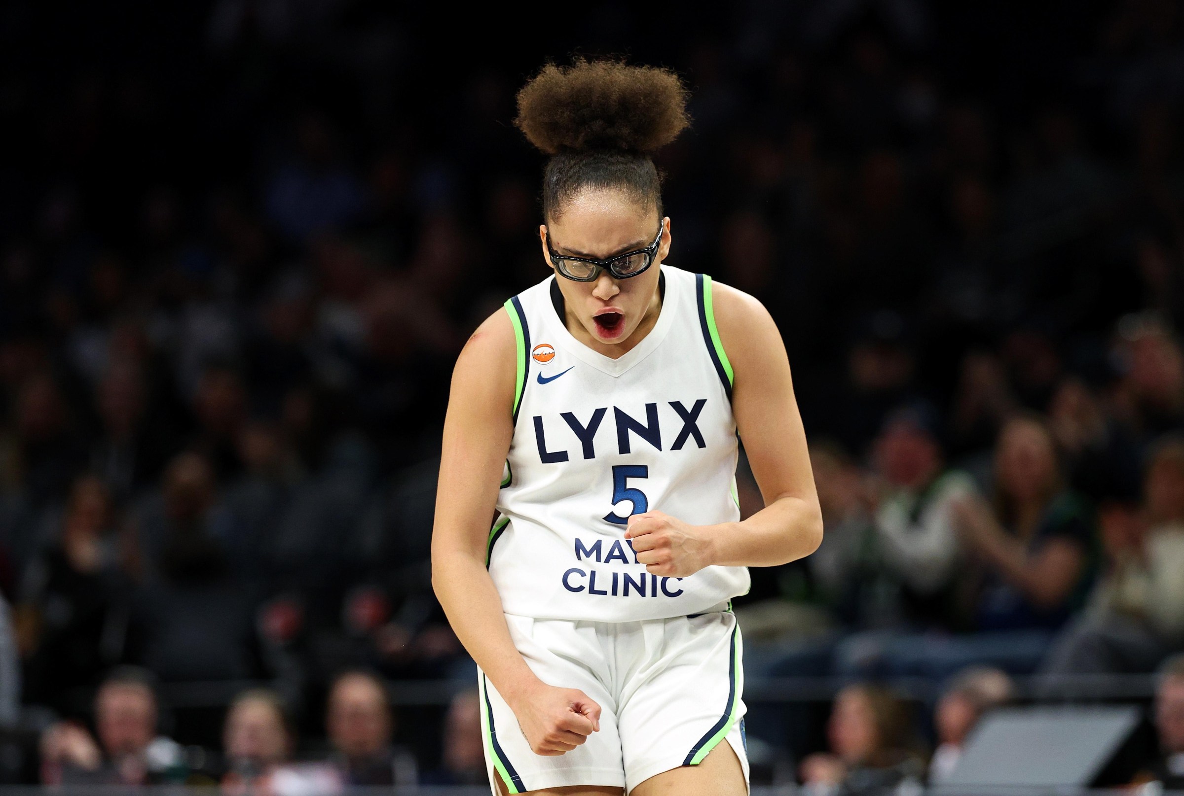 MINNEAPOLIS, MINNESOTA - MAY 01: Olivia Miles #5 of the Minnesota Lynx celebrates against the Toronto Tempo in the fourth quarter of a preseason game at Target Center on May 01, 2026 in Minneapolis, Minnesota. The Lynx defeated the Tempo 73-66. NOTE TO USER: User expressly acknowledges and agrees that, by downloading and or using this photograph, User is consenting to the terms and conditions of the Getty Images License Agreement. (Photo by David Berding/Getty Images)