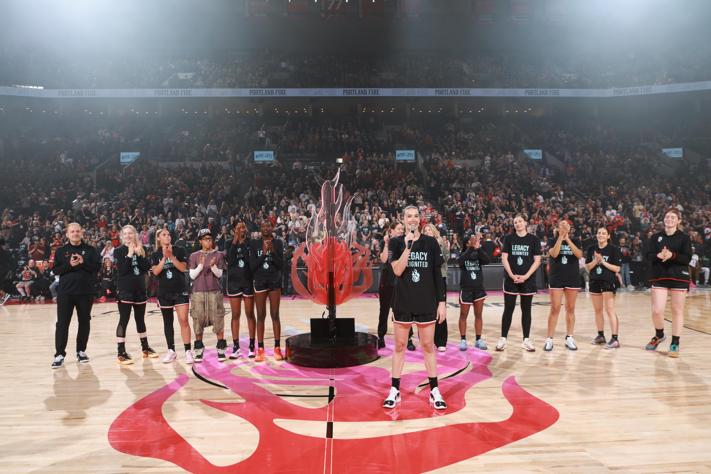 PORTLAND, OR - MAY 9: Bridget Carleton #6 of the Portland Fire talks to the fans before the game against the Chicago Sky on May 9, 2026 at Moda Center in Portland, Oregon. NOTE TO USER: User expressly acknowledges and agrees that, by downloading and or using this Photograph, user is consenting to the terms and conditions of the Getty Images License Agreement. Mandatory Copyright Notice: Copyright 2026 NBAE (Photo by Cameron Browne/NBAE via Getty Images)