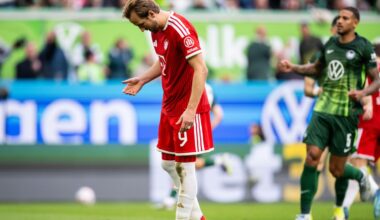 A Wolfsburg player tampers with the penalty spot before Harry Kane miss