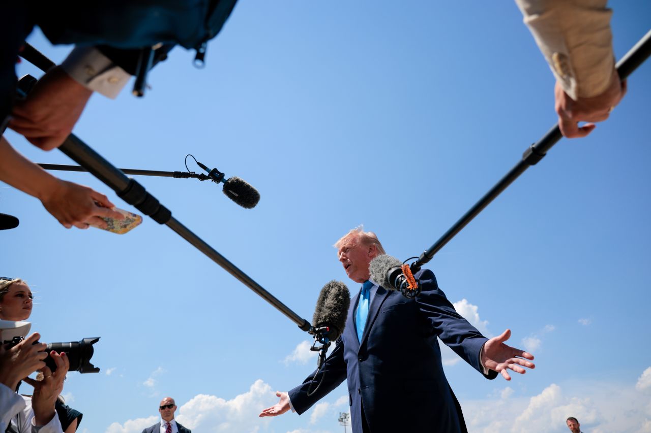 President Donald Trump speaks to reporters after departing Air Force One on May 20 at Joint Base Andrews, Maryland.