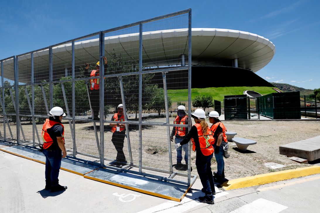 Workers set up 4-meter-high metal fences for security ahead of the 2026 FIFA World Cup outside the Guadalajara Stadium in Zapopan, Jalisco state, Mexico, on May 28, 2026.