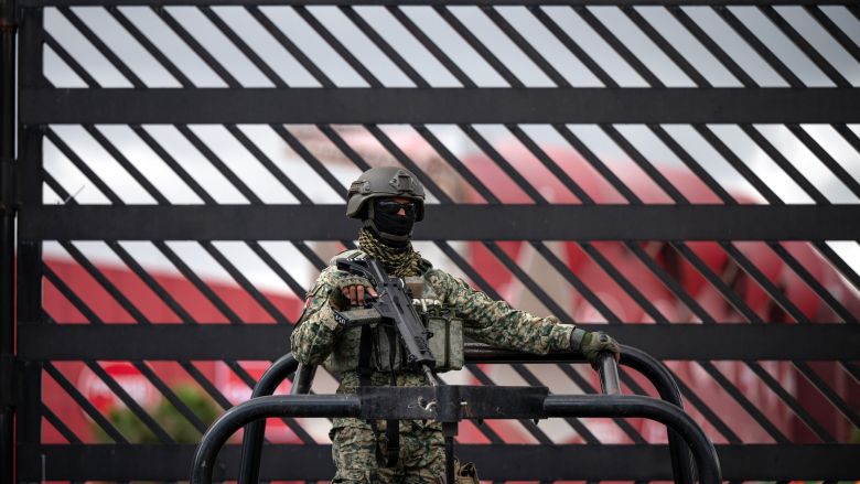 An army officer guards the entrance of the Caliente Stadium in Tijuana, Baja California state, Mexico, on May 29, 2026, where Iran has relocated its training camp ahead of the 2026 FIFA World Cup.