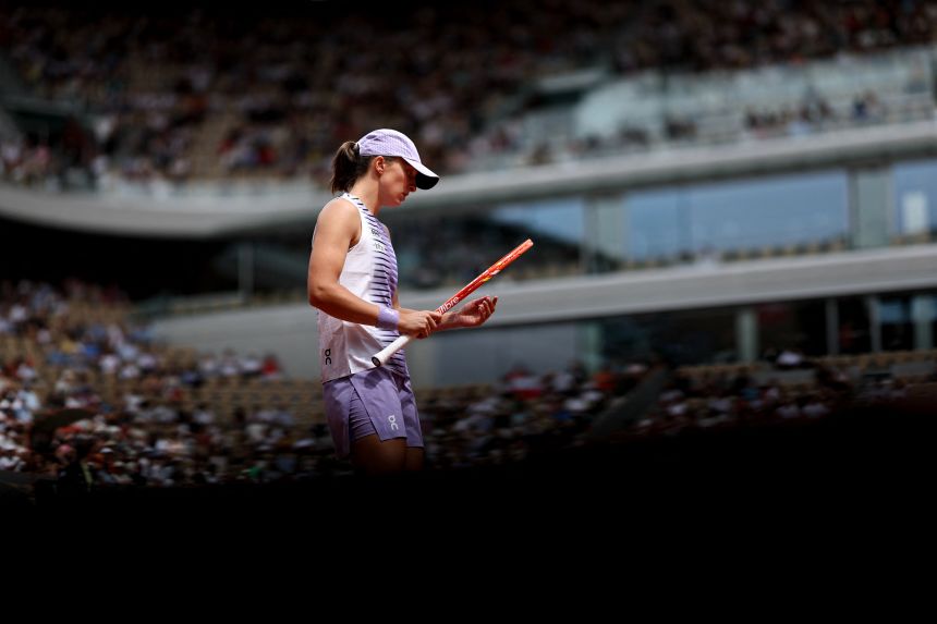 Four-time Roland Garros winner Iga Swiatek of Poland fell to Ukraine's Marta Kostyuk in the 4th round at the French Open on May 31, 2026.