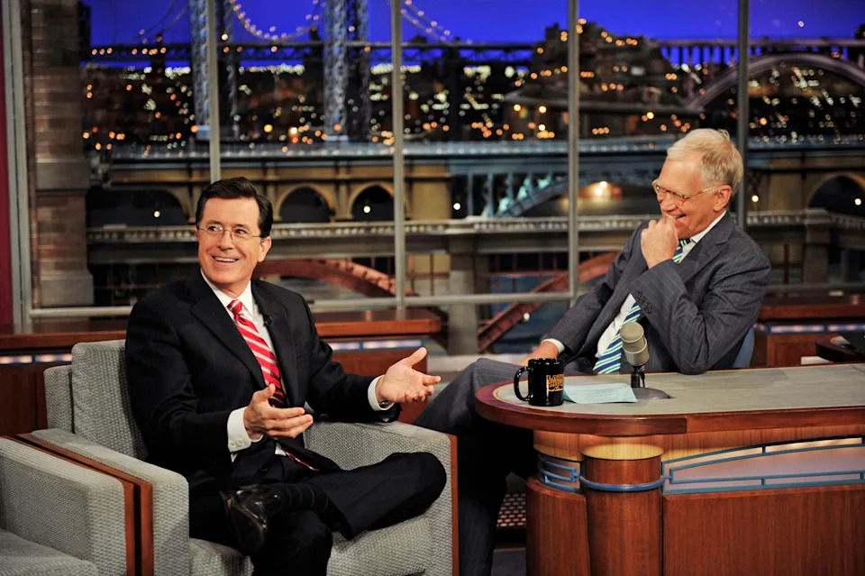 Stephen Colbert and David Letterman during a taping of "The Late Show" in 2012