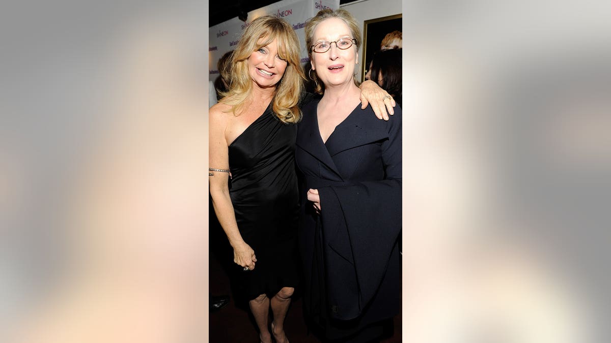 Goldie Hawn and Meryl Streep standing together at Radio City Music Hall