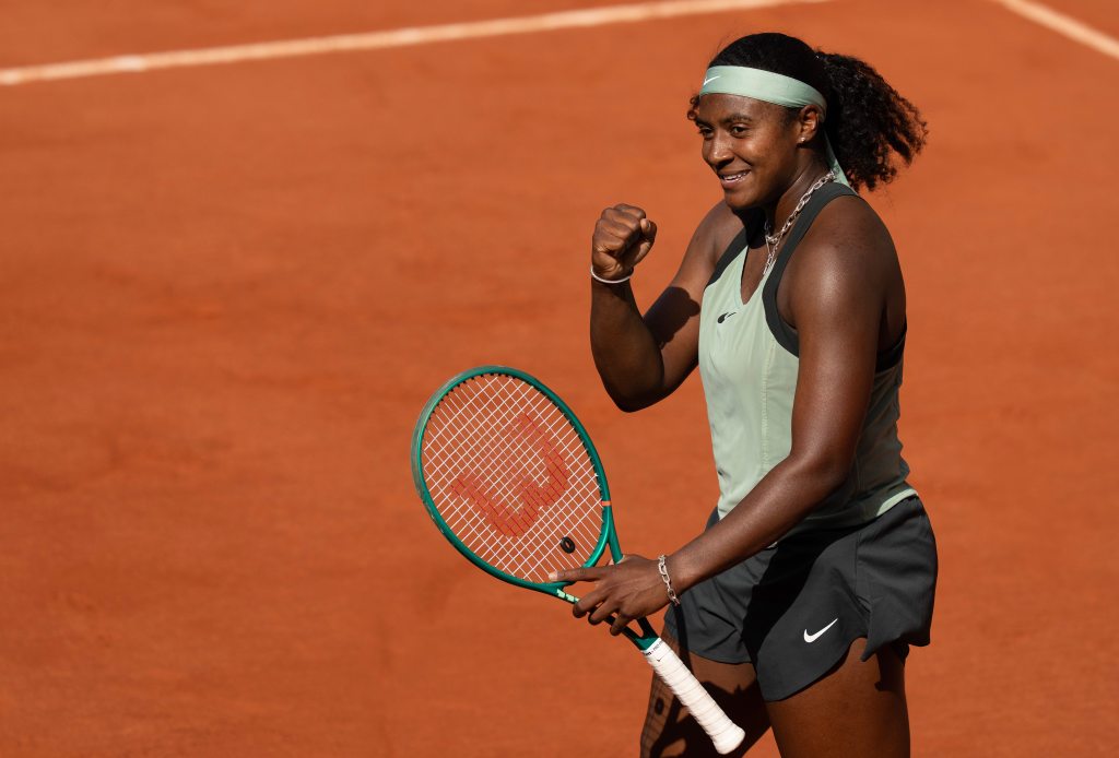 Hailey Baptiste celebrates winning her first round match at the French Open.