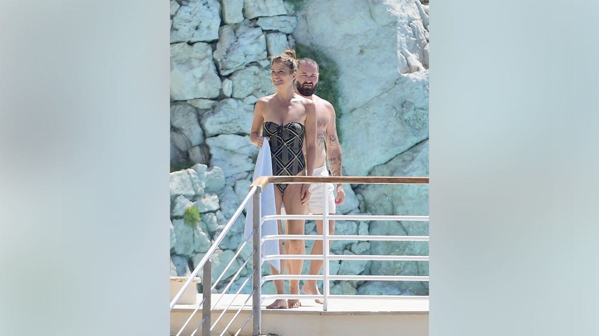 Helena Christensen in a swimsuit while in France in May 2026.