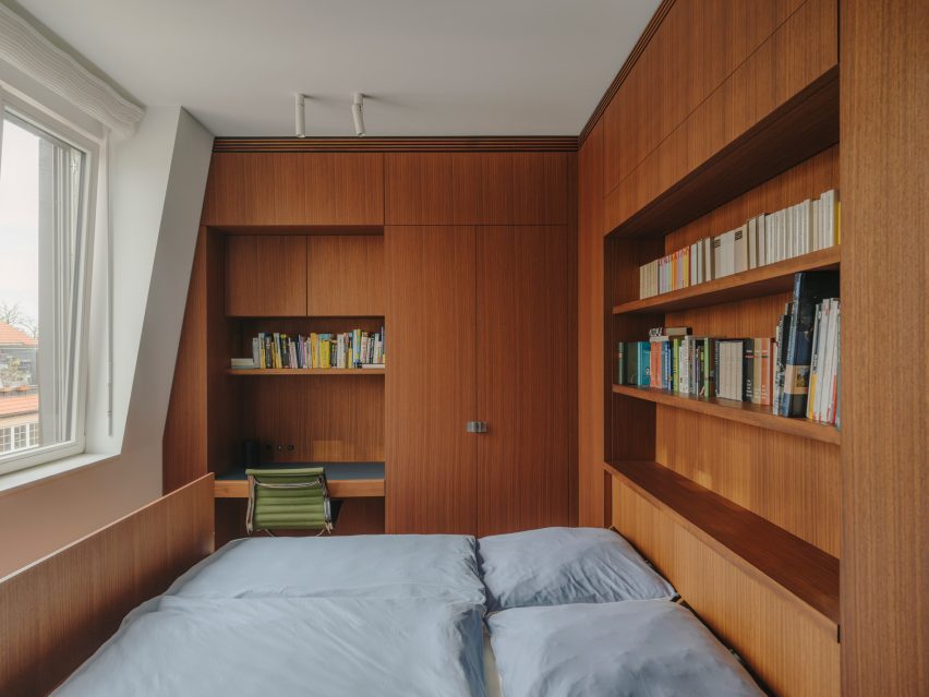 Wood-lined bedroom