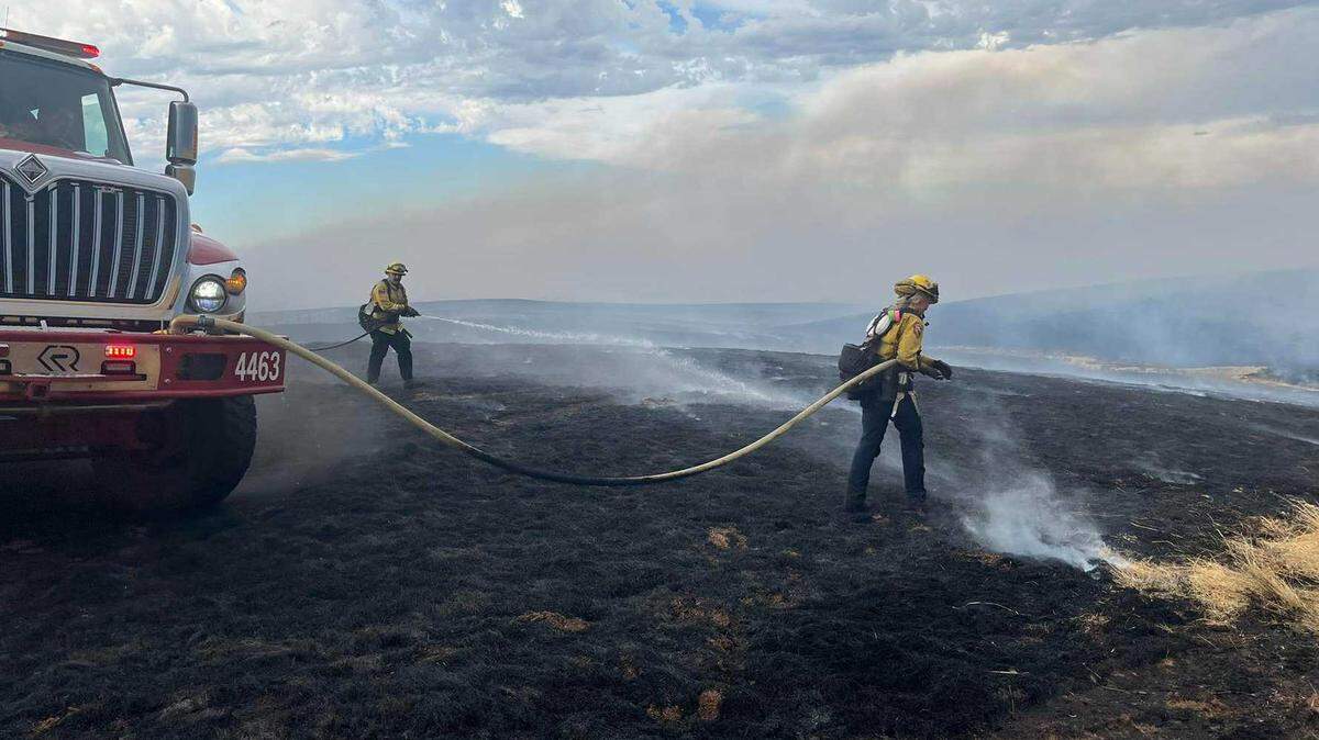 Firefighters douse flames on one of several wildfires that sparked Tuesday, Sept. 2, 2025, in Tuolumne and Calaveras counties. The union representing state firefighters is pushing for a new retirement benefit for older members. Firefighters douse flames on one of several wildfires that sparked Tuesday, Sept. 2, 2025, in Tuolumne and Calaveras counties. The union representing state firefighters is pushing for a new retirement benefit for older members.