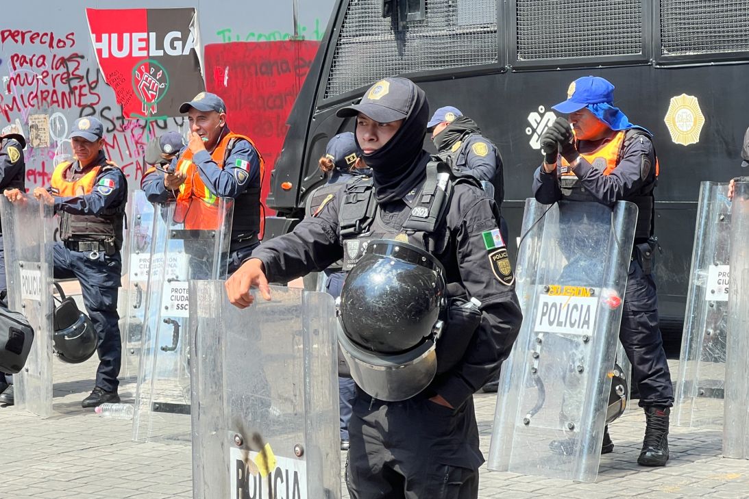 Security forces guard Mexico City's main plaza, El Zocalo, as construction crews set up a stage for a World Cup fan festival, on May 29, 2026.