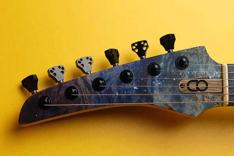 natural geometrics and organic variation inform omer deutsch's handcrafted guitars - 2