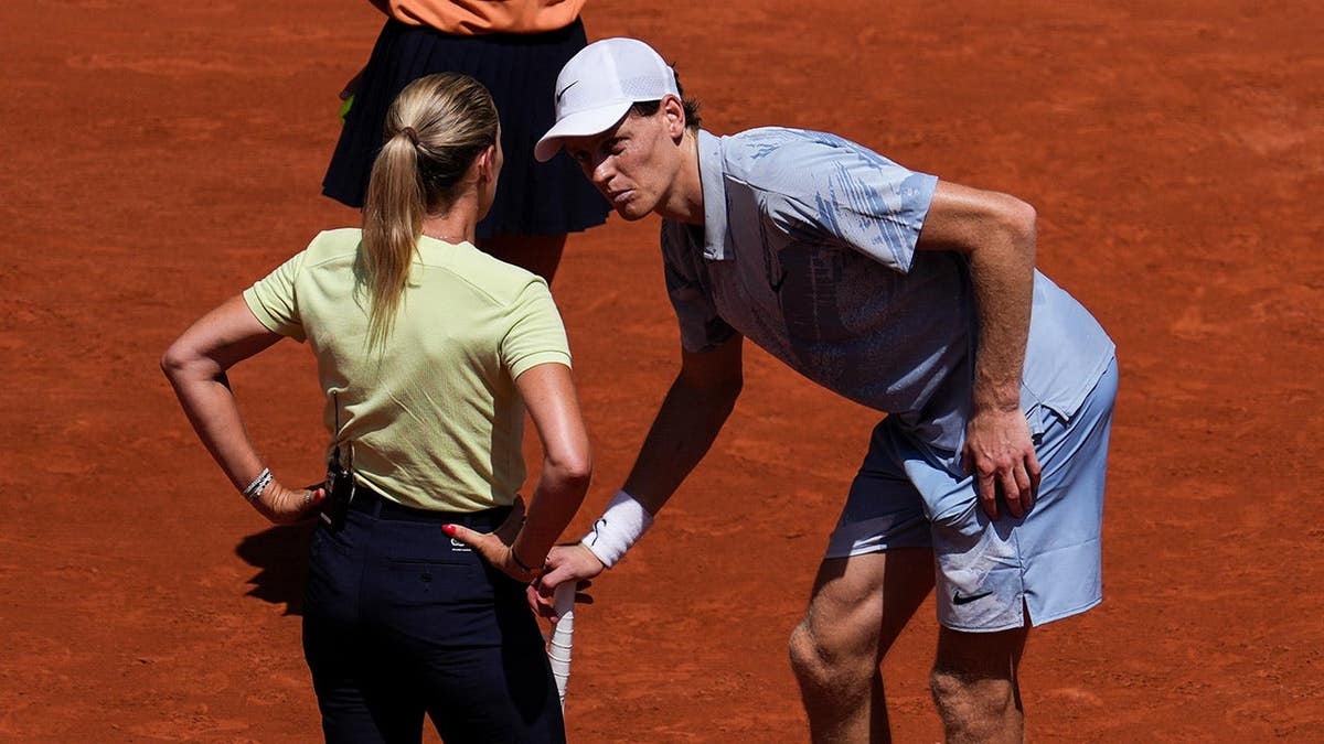 Jannik Sinner reacting during a men's singles tennis match at the French Open in Paris