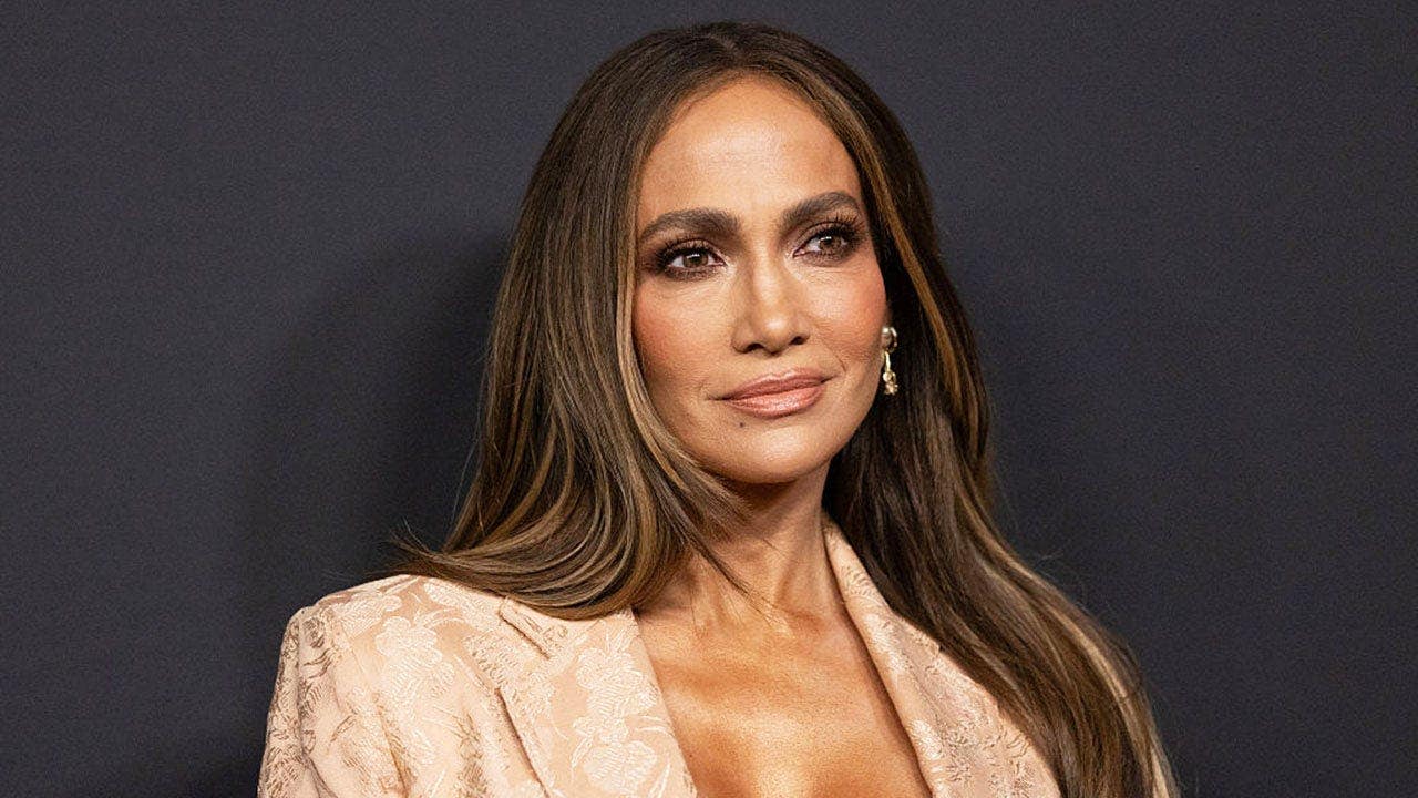 Jennifer Lopez's dress holds on for dear life at her Netflix event, Trump powers through some wine & Kay Adams