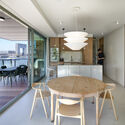 © Jeroen Musch KAAP - Residential District and Circular Pavilion / Powerhouse Company + Orange Architects + NEXT architects - Interior Photography, Dining room, Wood, Table, Chair, Lighting, Glass