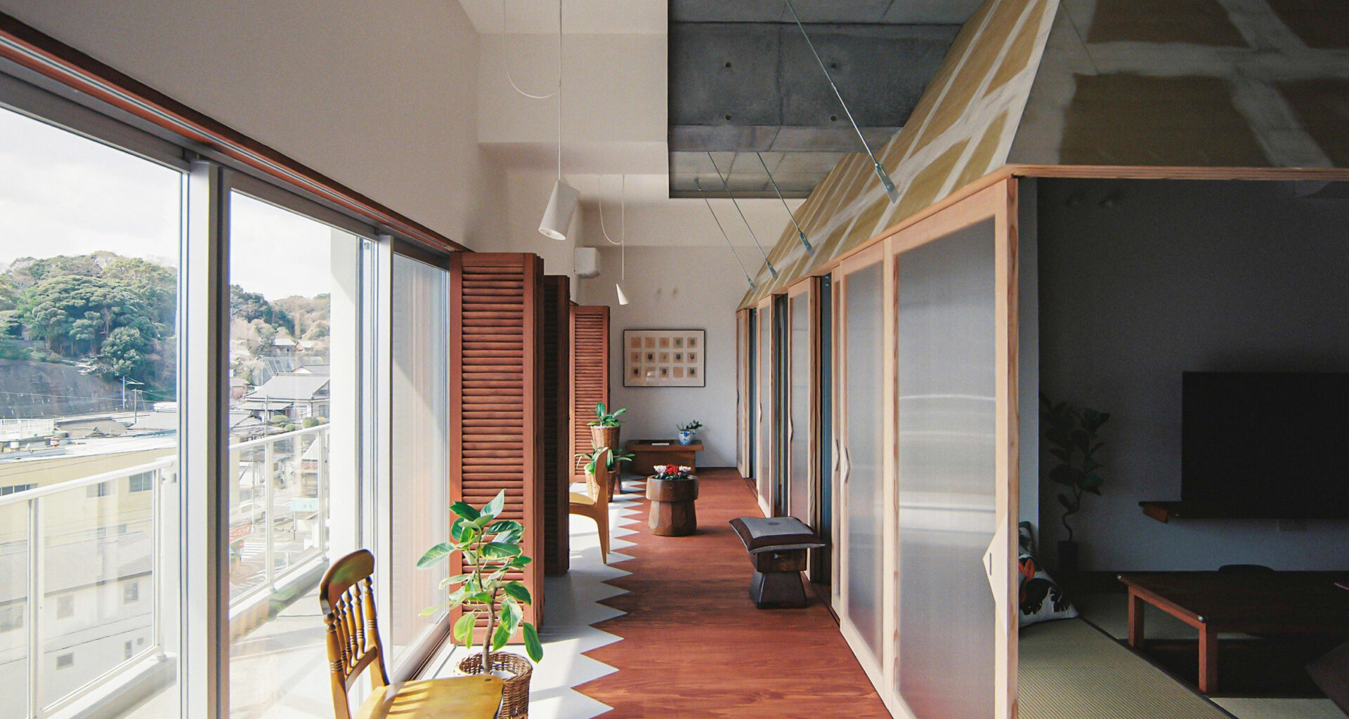 Kuma&Elsa arranges apartments around translucent "huts"