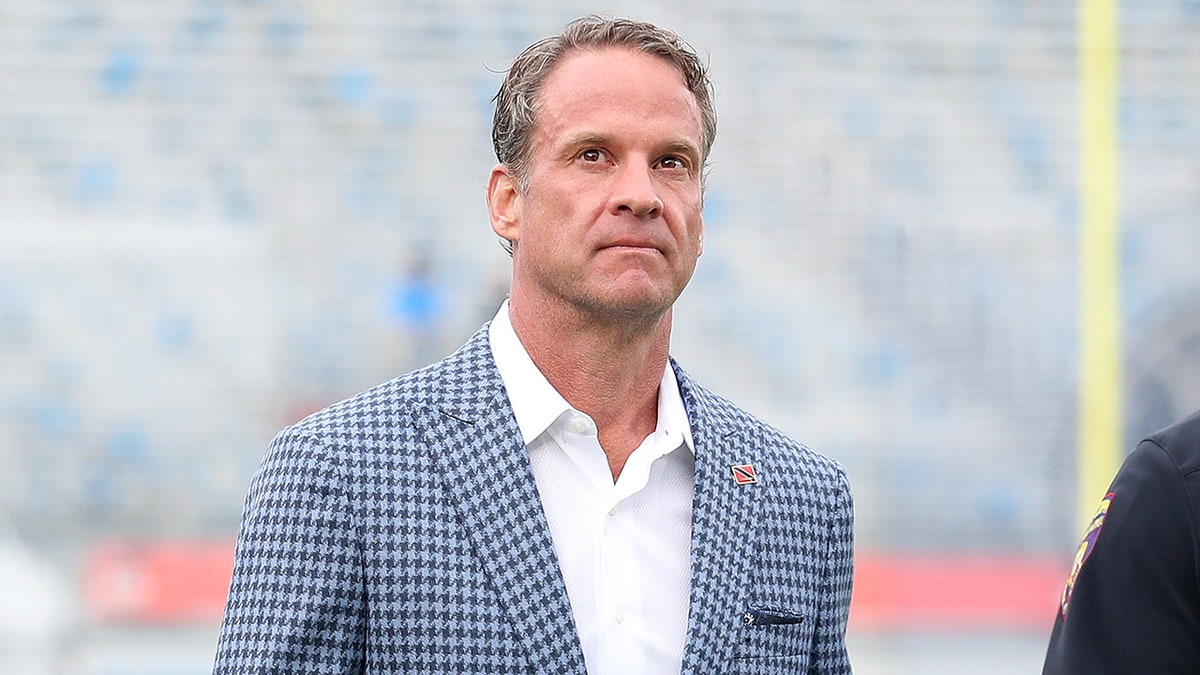 Lane Kiffin standing on the sidelines at Vaught-Hemingway Stadium in Oxford, Mississippi