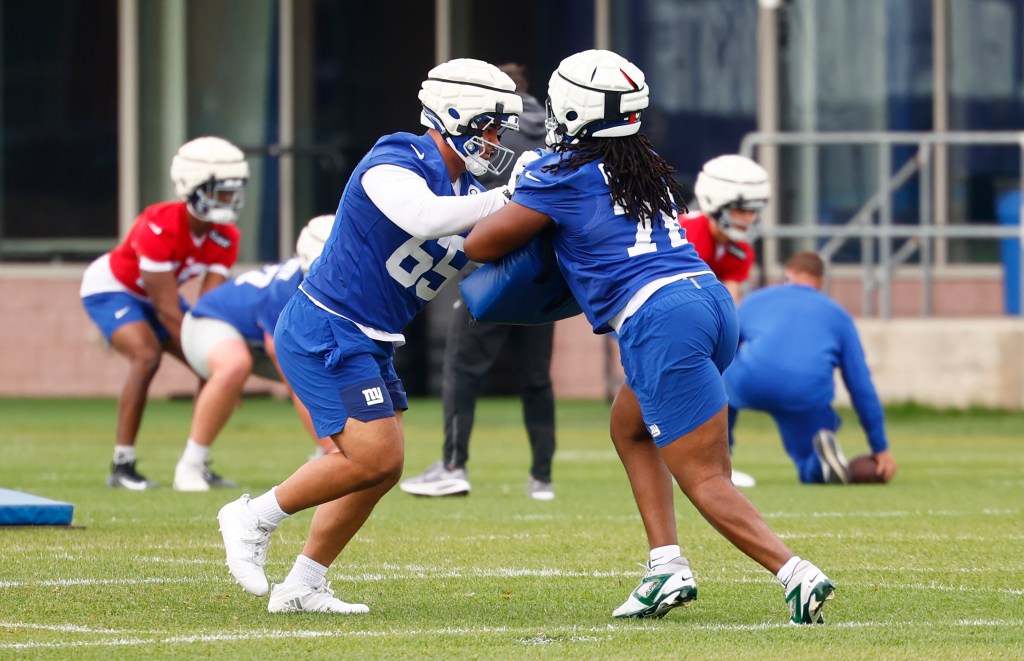 New York Giants players Francis Mauigoa (65) and Derrick Graham (76) during football practice.
