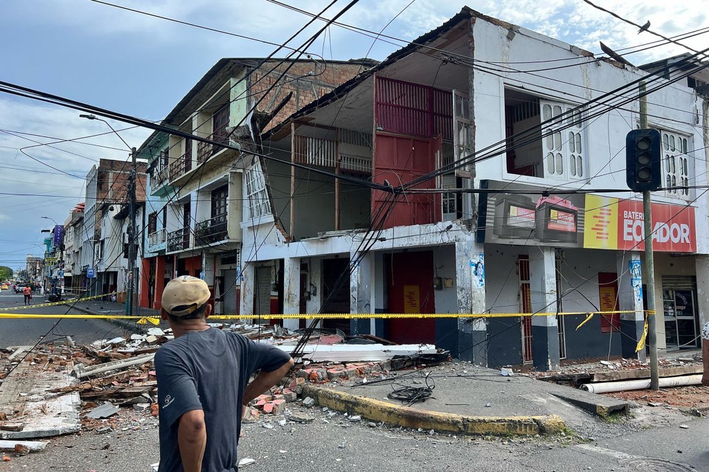Damaged house on street.