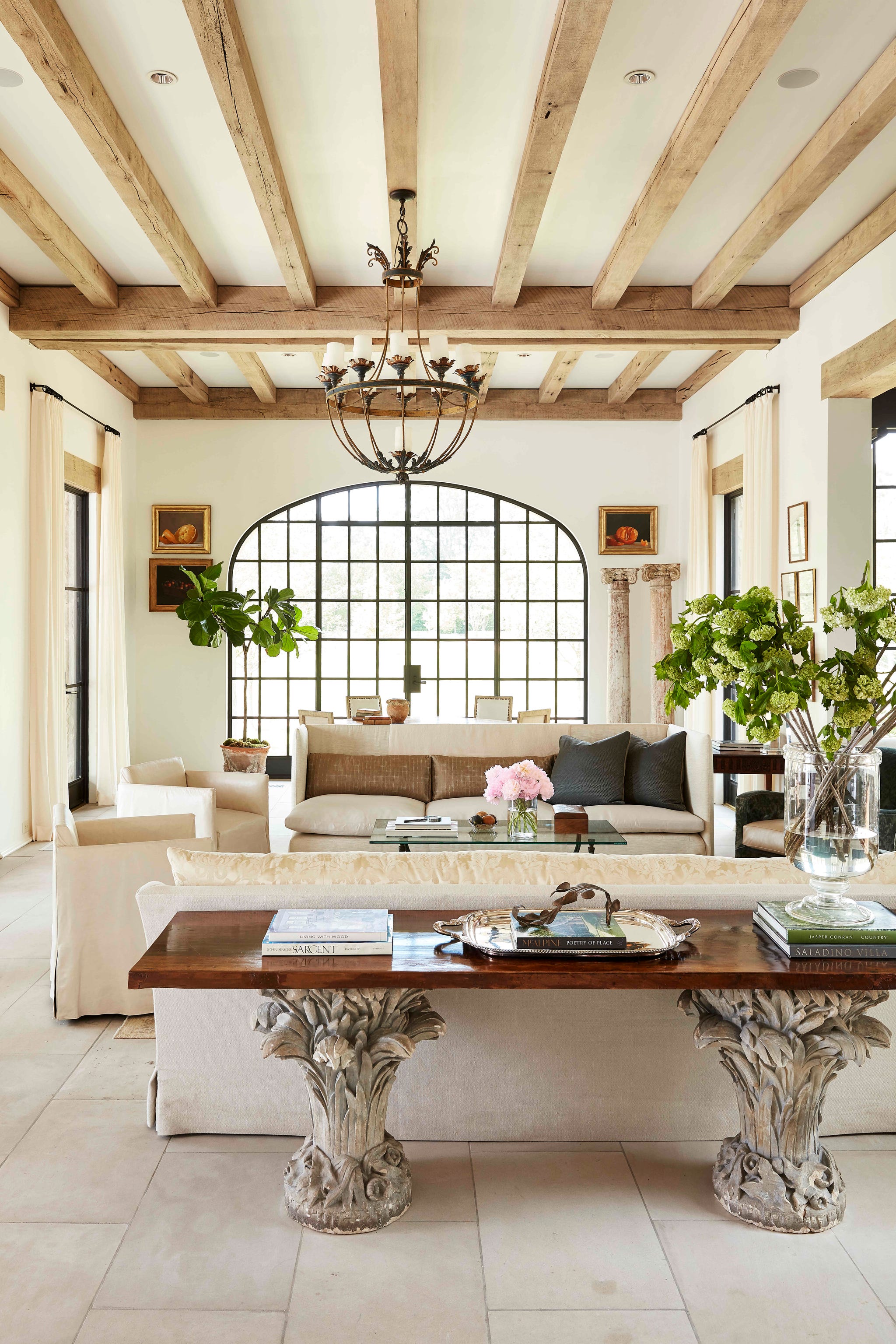 melanie pounds mountain brook house tour living room generous banks of steel cased windows frame a salon punctuated with a mix of hand hewn antiques