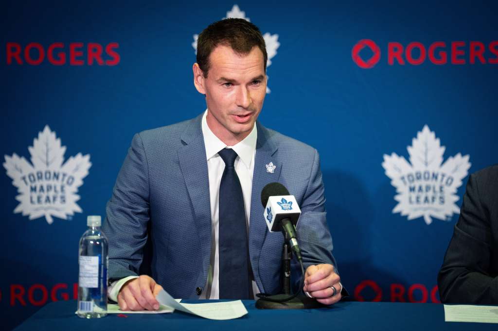 John Chayka, General Manager of the Toronto Maple Leafs, speaking at a press conference.