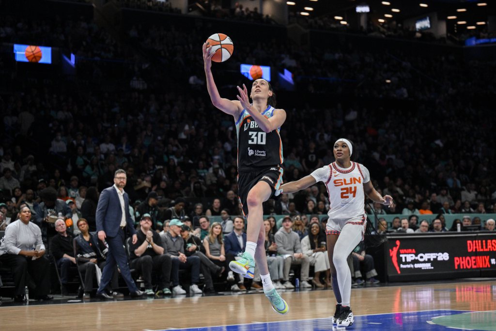 New York Liberty forward Breanna Stewart (30) drives past Connecticut Sun forward Aneesah Morrow (24) during the first half at Barclays Center.