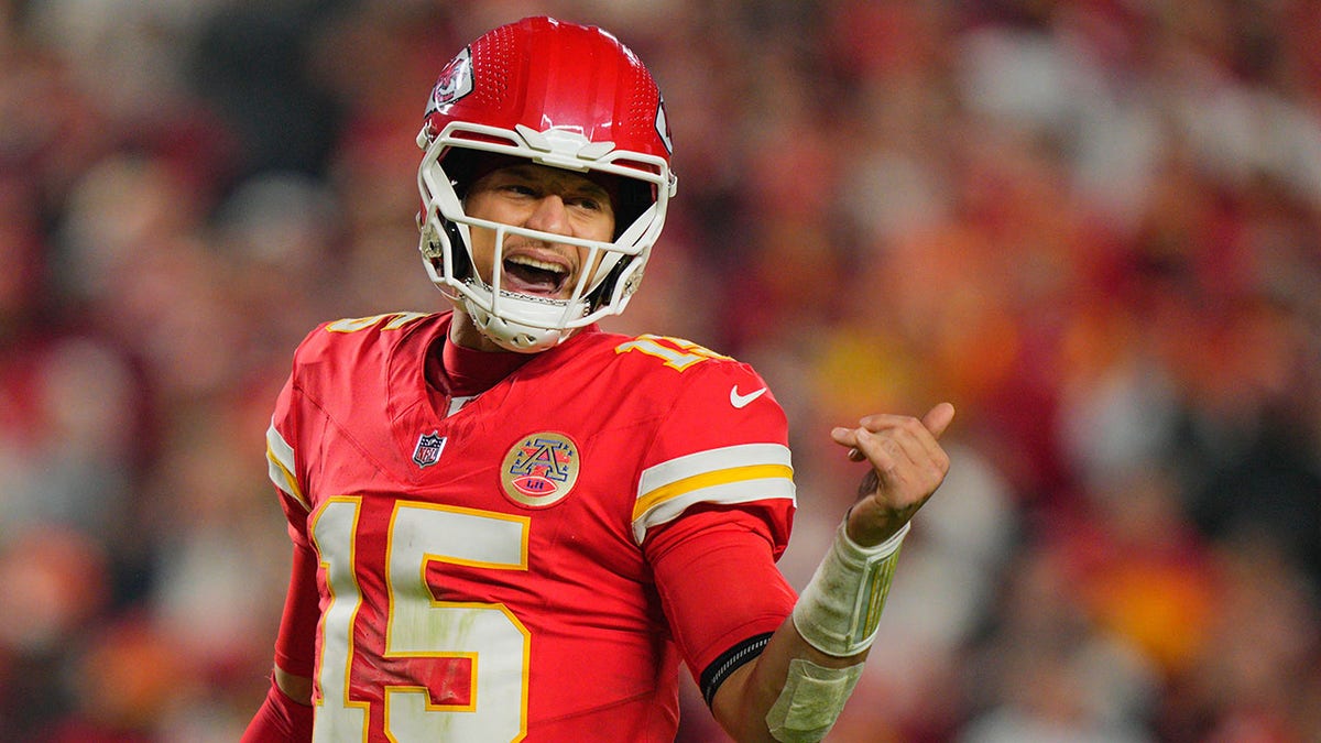 Kansas City Chiefs quarterback Patrick Mahomes calls out signals on the field at Arrowhead Stadium