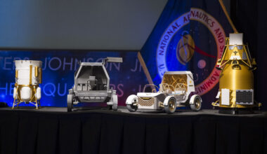 From left to right, models of the Blue Origin Mark 1 Lunar Lander, Astrolab Crewed Lunar Rover, Lunar Outpost Pegasus rover, and the Firely Elytra Dark orbiter are seen at the conclusion of a news conference to discuss Moon Base, a long-term lunar exploration and infrastructure initiative designed to enable sustained human presence and expanded scientific and commercial activity at the lunar South Pole, Tuesday, May 26, 2026, at the Mary W. Jackson NASA Headquarters building in Washington. Photo Credit: (NASA/Aubrey Gemignani)