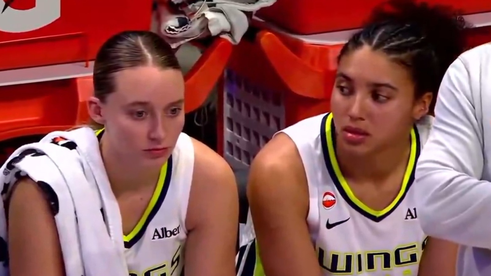 Paige Bueckers and Azzi Fudd on the bench
