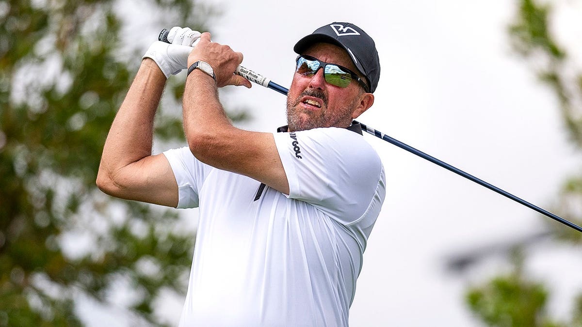Phil Mickelson playing a golf shot from the fifth tee at The Club at Steyn City