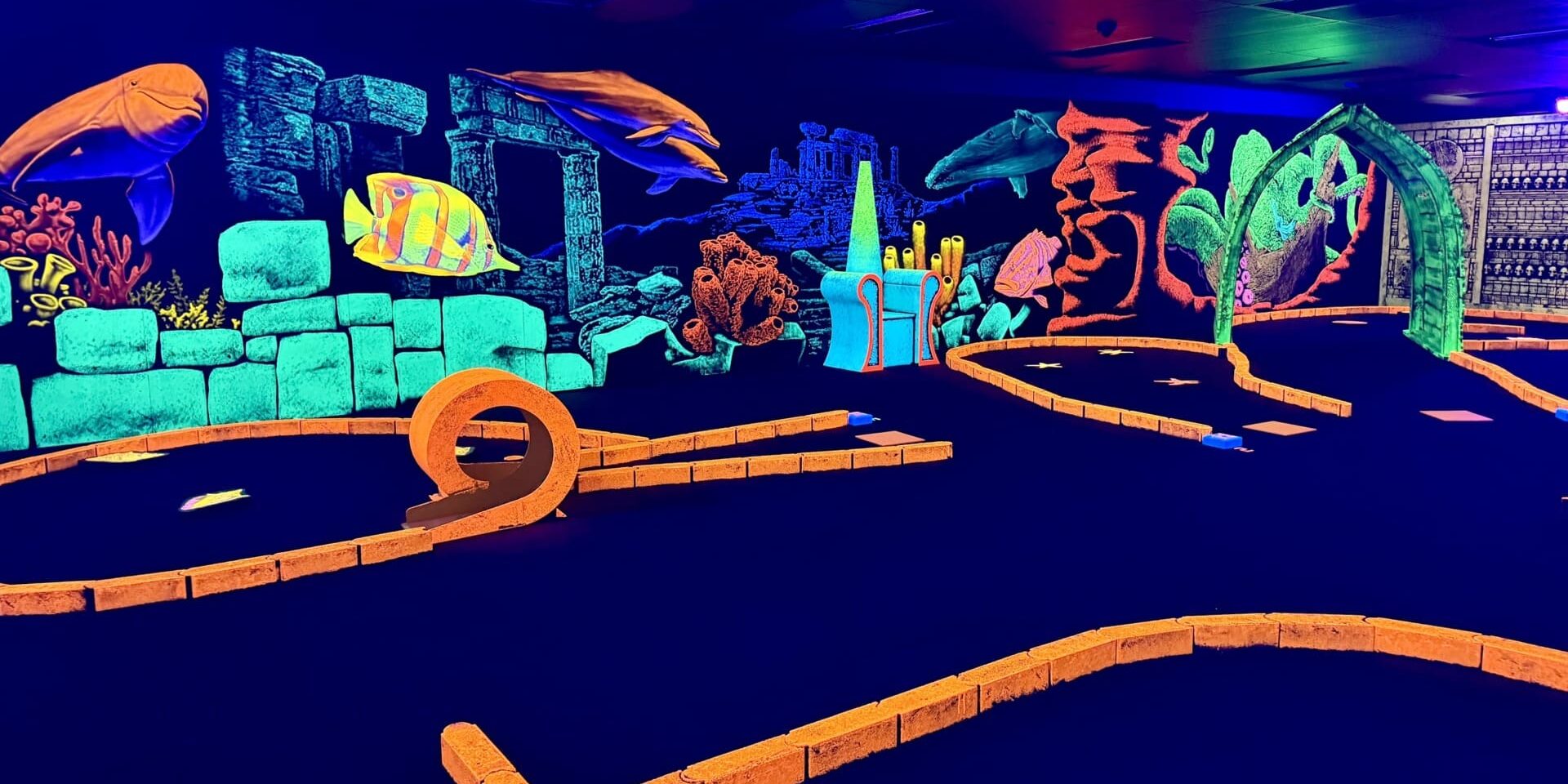 Black-lit miniature golf course opens in east Sioux Falls
