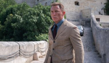 James Bond (Daniel Craig) in a tan suit in a scene from "No Time to Die"