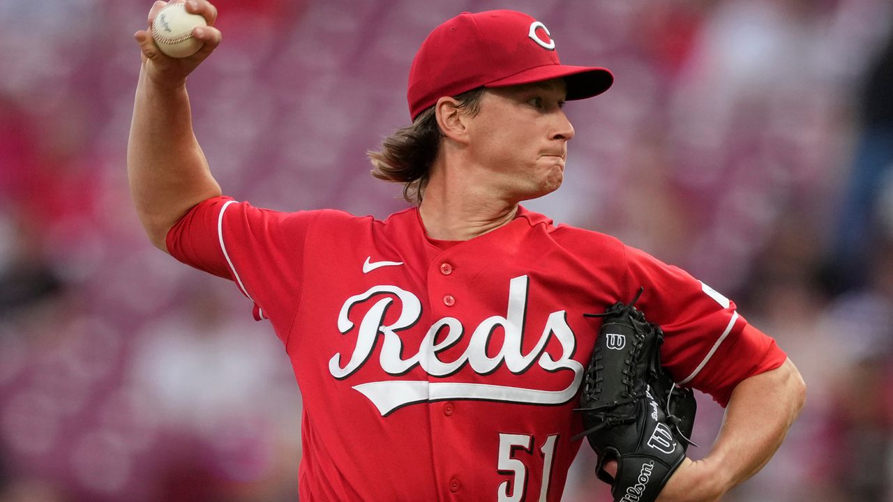 Cincinnati Reds pitcher Brady Singer throws during the third inning of a baseball game against the San Francisco Giants in Cincinnati, Tuesday, April 14, 2026. (AP Photo/Carolyn Kaster)